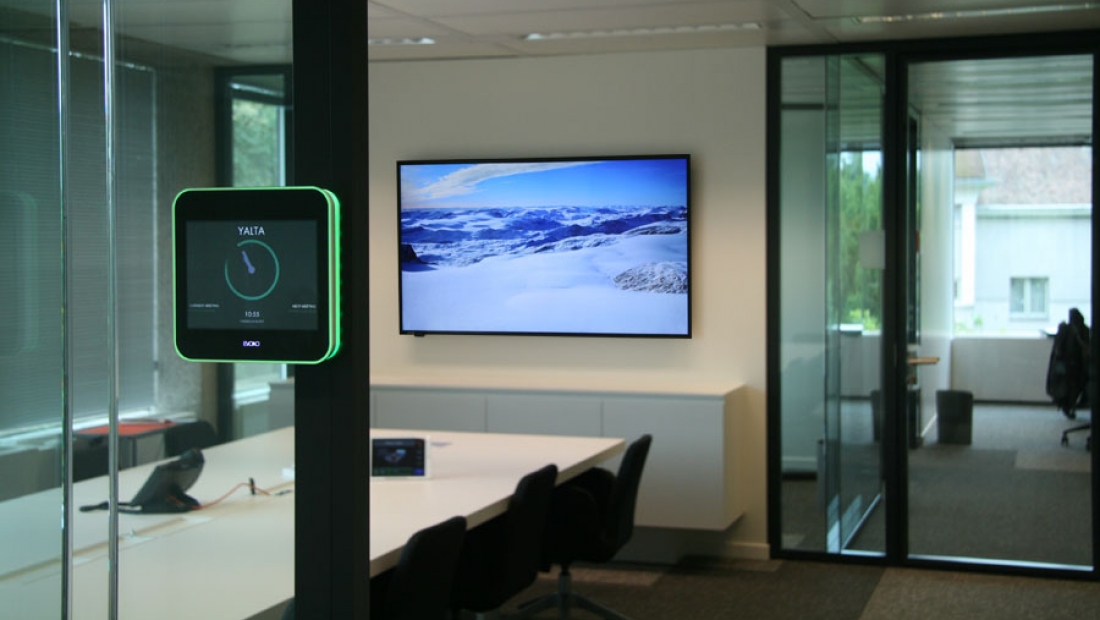 Meeting Room Booking System Singapore dashboard interface on a display.
